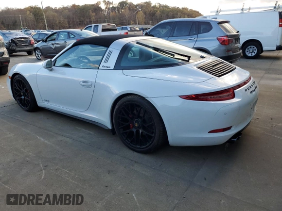 2016 Porsche 911 4S with VIN WP0BB2A93GS136097, listed as a Copart auction lot 76078574 with 14,208 mi miles and Salvage Title. Bid and sale history available at DreamBid. Image 2.