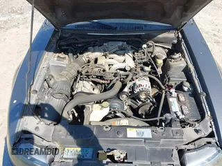 2004 Ford Mustang Standard z VIN 1FAFP40644F236905, wystawiony jako IAAI lot #42016081 z przebiegiem 167 733 mil mil oraz . Historia ofert i sprzedaży dostępna na DreamBid. Obrazek 10.