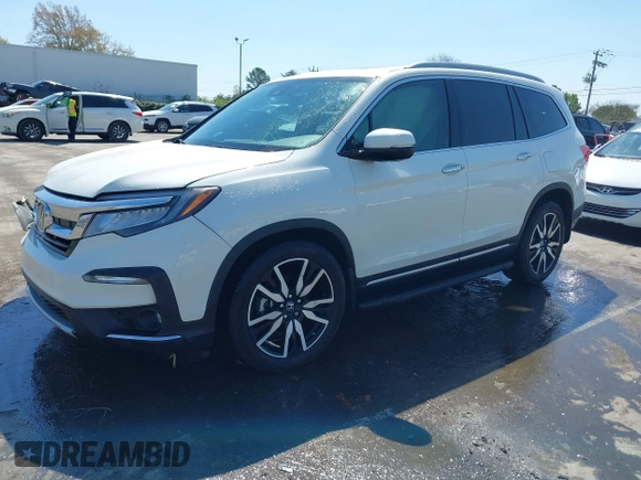 2019 Honda Pilot Touring 8-Passenger z VIN 5FNYF5H93KB021978, wystawiony jako IAAI lot #41915333 z przebiegiem 82 676 mil mil oraz . Historia ofert i sprzedaży dostępna na DreamBid. Obrazek 17.