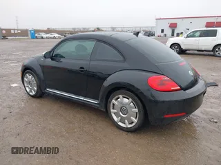 2013 Volkswagen Beetle 2.5L w/Sun/Sound/Nav with VIN 3VWJX7AT1DM686146, listed as a IAAI auction lot 41444277 with 92,964 mi miles and . Bid and sale history available at DreamBid. Image 3.