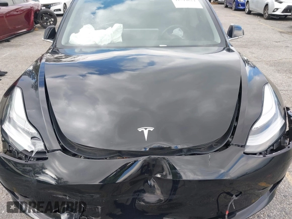 2018 Tesla Model 3 Long Range Battery with VIN 5YJ3E1EA9JF009384, listed as a IAAI auction lot 41544624 with 66,896 mi miles and . Bid and sale history available at DreamBid. Image 10.