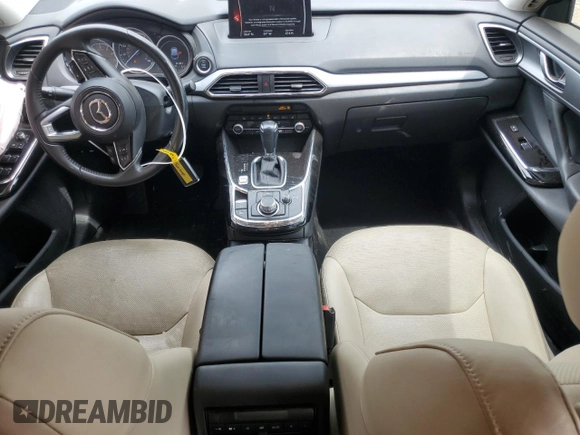 2020 Mazda CX-9 Touring z VIN JM3TCACY3L0411822, wystawiony jako Copart lot #60323295 z przebiegiem 61 348 mil mil oraz Szkoda całkowita • Salvage title. Historia ofert i sprzedaży dostępna na DreamBid. Obrazek 8.