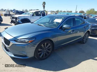 2018 Mazda 6 Grand Touring with VIN JM1GL1TY4J1333021, listed as a IAAI auction lot 41818719 with 56,188 mi miles and . Bid and sale history available at DreamBid. Image 14.