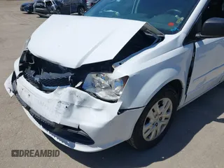2016 Dodge Grand Caravan SE with VIN 2C4RDGBG2GR311654, listed as a IAAI auction lot 42056032 with 185,330 mi miles and . Bid and sale history available at DreamBid. Image 6.