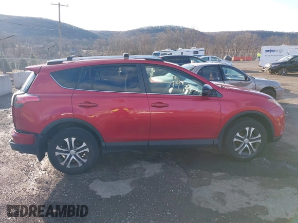 2016 Toyota RAV4 LE with VIN JTMBFREVXGJ100692, listed as a IAAI auction lot 41847333 with 130,822 mi miles. Bid and sale history available at carsss.com. Image 13.