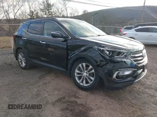 2017 Hyundai Santa Fe 2.0T z VIN 5XYZUDLA8HG502333, wystawiony jako IAAI lot #41246195 z przebiegiem 62 772 mil mil oraz . Historia ofert i sprzedaży dostępna na DreamBid. Obrazek 1.