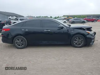 2020 Kia Optima LX with VIN 5XXGT4L37LG445597, listed as a IAAI auction lot 42404651 with 56,851 mi miles and . Bid and sale history available at DreamBid. Image 13.