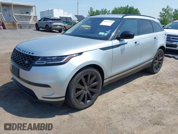 2020 Land Rover Range Rover Velar S z VIN SALYB2EX4LA242330, wystawiony jako IAAI lot #42479335 z przebiegiem 99 712 mil mil oraz . Historia ofert i sprzedaży dostępna na DreamBid. Obrazek 17.