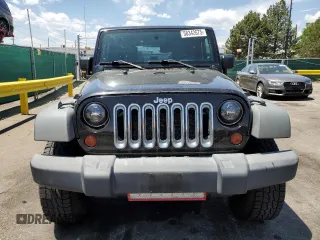 2009 Jeep Wrangler X z VIN 1J4FA24179L716499, wystawiony jako Copart lot #58342675 z przebiegiem 116 871 mil mil oraz Szkoda całkowita • Salvage title. Historia ofert i sprzedaży dostępna na DreamBid. Obrazek 5.
