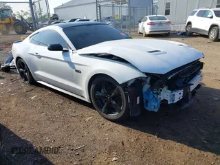 2023 Ford Mustang GT with VIN 1FA6P8CF6P5304456, listed as a IAAI auction lot 42407246 with 59,538 mi miles and . Bid and sale history available at DreamBid. Image 1.