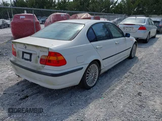 2003 BMW 3 Series 330i with VIN WBAEV53443KM30865, listed as a IAAI auction lot 42027481 with 1 mi miles. Bid and sale history available at carsss.com. Image 4.