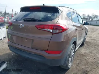 2017 Hyundai Tucson SE Plus with VIN KM8J33A45HU443937, listed as a IAAI auction lot 41652543 with 127,332 mi miles. Bid and sale history available at carsss.com. Image 4.