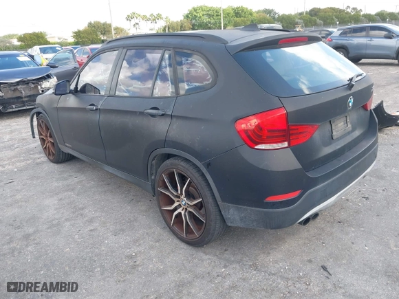 2015 BMW X1 sDrive28i with VIN WBAVM1C56FV314381, listed as a IAAI auction lot 41961245 with 68,182 mi miles. Bid and sale history available at carsss.com. Image 3.