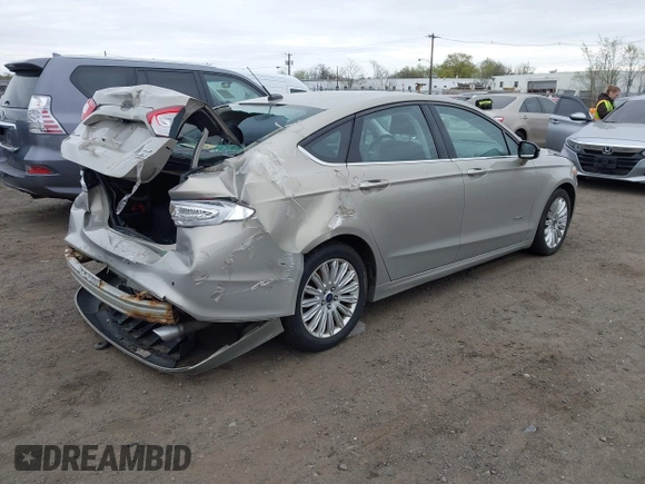 2015 Ford Fusion SE Hybrid with VIN 3FA6P0LU6FR210606, listed as a IAAI auction lot 42070466 with 123,043 mi miles and . Bid and sale history available at DreamBid. Image 4.