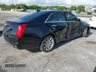 2015 Cadillac CTS RWD with VIN 1G6AP5SX8F0140364, listed as a IAAI auction lot 42535236 with 126,277 mi miles and . Bid and sale history available at DreamBid. Image 4.