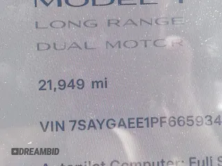 2023 Tesla Model Y Long Range with VIN 7SAYGAEE1PF665934, listed as a IAAI auction lot 41780949 with 21,949 mi miles and . Bid and sale history available at DreamBid. Image 14.
