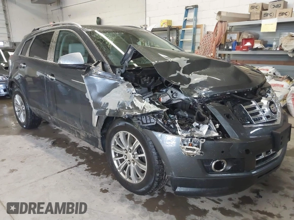 2013 Cadillac SRX Performance Collection with VIN 3GYFNHE37DS530908, listed as a IAAI auction lot 41662796 with 80,254 mi miles. Bid and sale history available at carsss.com. Image 6.