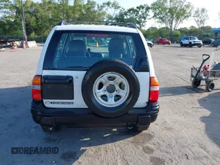 2001 Chevrolet Tracker z VIN 2CNBE13C916939402, wystawiony jako IAAI lot #42232082 z przebiegiem 103 693 mil mil oraz . Historia ofert i sprzedaży dostępna na DreamBid. Obrazek 17.