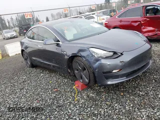 2019 Tesla Model 3 Mid Range z VIN 5YJ3E1EA0KF312510, wystawiony jako IAAI lot #40993652 z przebiegiem 42 474 mil mil oraz . Historia ofert i sprzedaży dostępna na DreamBid. Obrazek 1.