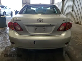 2010 Toyota Corolla with VIN 1NXBU4EE9AZ359085, listed as a Copart auction lot 62379755 with 107,160 mi miles and Salvage title. Bid and sale history available at DreamBid. Image 6.