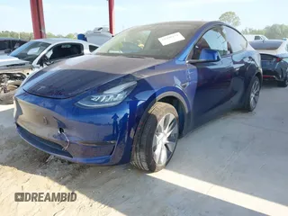 2022 Tesla Model Y Long Range z VIN 7SAYGAEE2NF364733, wystawiony jako IAAI lot #42290231 z przebiegiem 33 907 mil mil oraz . Historia ofert i sprzedaży dostępna na DreamBid. Obrazek 17.