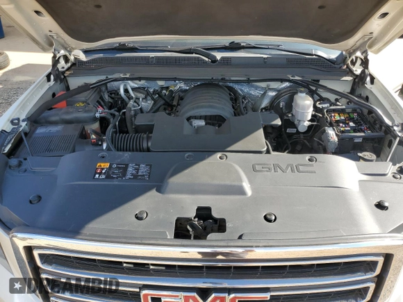 2015 GMC Yukon SLT with VIN 1GKS2BKC1FR736203, listed as a Copart auction lot 67977694 with 178,781 mi miles and Salvage Title. Bid and sale history available at carsss.com. Image 14.