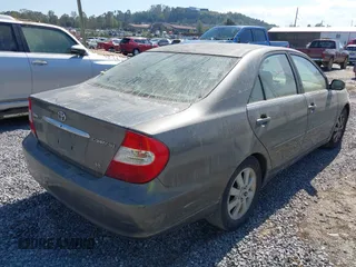2004 Toyota Camry LE with VIN 4T1BF30K94U576450, listed as a IAAI auction lot 40541915 with Not Provided miles and . Bid and sale history available at carsss.com. Image 4.