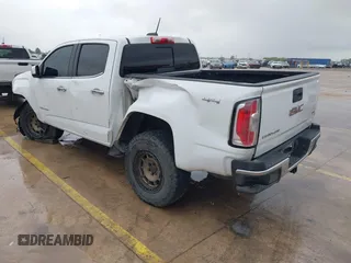 2018 GMC Canyon 4WD SLT with VIN 1GTP6DE18J1111056, listed as a IAAI auction lot 41903405 with 99,280 mi miles. Bid and sale history available at carsss.com. Image 3.