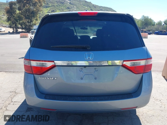 2012 Honda Odyssey EX-L with VIN 5FNRL5H69CB003067, listed as a IAAI auction lot 41862591 with 163,158 mi miles and . Bid and sale history available at carsss.com. Image 16.