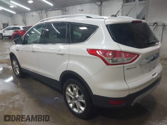 2014 Ford Escape Titanium with VIN 1FMCU9J90EUD21552, listed as a IAAI auction lot 42102148 with 183,539 mi miles. Bid and sale history available at carsss.com. Image 3.