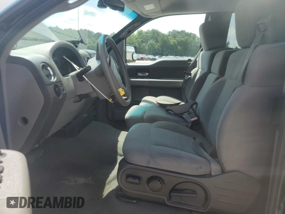 2007 Ford F-150 XL with VIN 1FTPX12V17FA62443, listed as a Copart auction lot 56409265 with 154,733 mi miles and Salvage title. Bid and sale history available at DreamBid. Image 7.