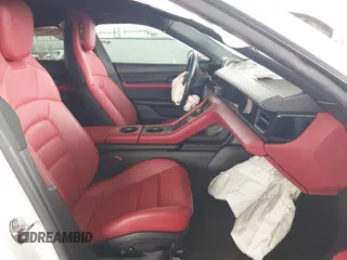 2021 Porsche Taycan z VIN WP0AA2Y19MSA19122, wystawiony jako IAAI lot #41925232 z przebiegiem 13 475 mil mil oraz . Historia ofert i sprzedaży dostępna na DreamBid. Obrazek 5.