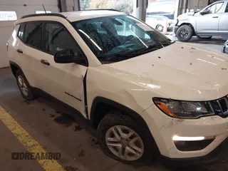 2018 Jeep Compass Sport with VIN 3C4NJCAB6JT124198, listed as a IAAI auction lot 41192196 with 104,557 mi miles. Bid and sale history available at carsss.com. Image 6.