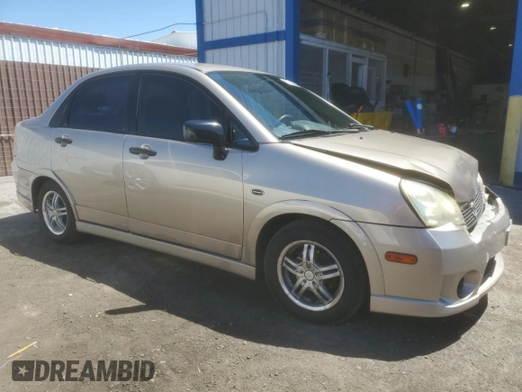 2006 Suzuki Aerio Premium z VIN JS2RA62S165300427, wystawiony jako Copart lot #57363605 z przebiegiem 141 824 mil mil oraz Szkoda całkowita • Salvage title. Historia ofert i sprzedaży dostępna na DreamBid. Obrazek 4.