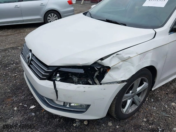 2015 Volkswagen Passat 1.8T Limited Edition with VIN 1VWAS7A30FC094529, listed as a IAAI auction lot 41531323 with 151,294 mi miles. Bid and sale history available at carsss.com. Image 6.