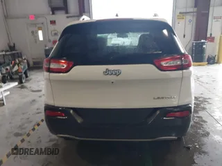 2016 Jeep Cherokee Limited z VIN 1C4PJLDB6GW355058, wystawiony jako IAAI lot #42231943 z przebiegiem 124 656 mil mil oraz . Historia ofert i sprzedaży dostępna na DreamBid. Obrazek 15.