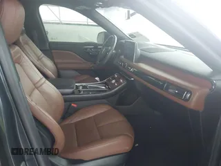 2022 Lincoln Aviator Reserve z VIN 5LM5J7WC2NGL15256, wystawiony jako IAAI lot #41533621 z przebiegiem 35 683 mil mil oraz . Historia ofert i sprzedaży dostępna na DreamBid. Obrazek 5.