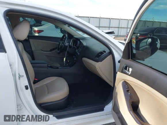 2015 Kia Optima EX with VIN 5XXGN4A77FG437245, listed as a IAAI auction lot 41560539 with 196,480 mi miles and . Bid and sale history available at DreamBid. Image 5.