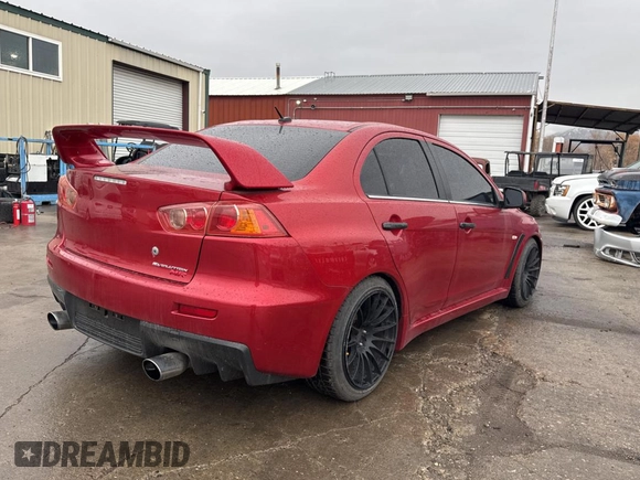 2008 Mitsubishi Lancer Evolution MR z VIN JA3AW56V78U051033, wystawiony jako Copart lot #82855894 z przebiegiem 92 726 mil mil oraz Szkoda całkowita • Salvage title. Historia ofert i sprzedaży dostępna na DreamBid. Obrazek 4.