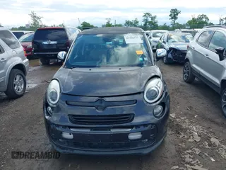 2015 FIAT 500L Lounge z VIN ZFBCFACH6FZ035281, wystawiony jako IAAI lot #42306531 z przebiegiem 99 810 mil mil oraz . Historia ofert i sprzedaży dostępna na DreamBid. Obrazek 13.