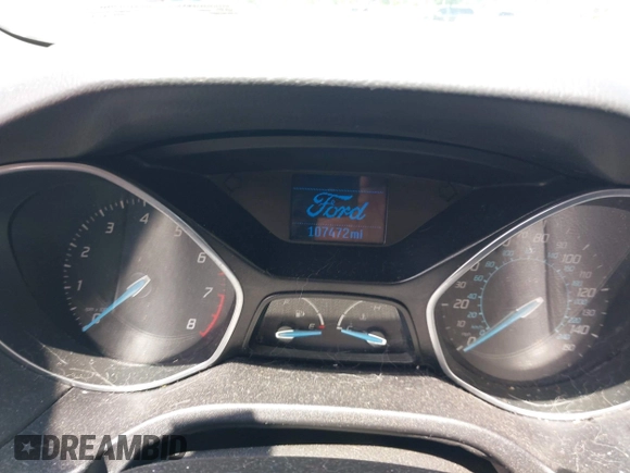 2012 Ford Focus SE z VIN 1FAHP3F22CL157417, wystawiony jako IAAI lot #42655527 z przebiegiem 107 472 mil mil oraz . Historia ofert i sprzedaży dostępna na DreamBid. Obrazek 7.