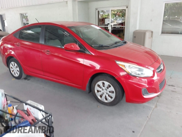 2015 Hyundai Accent GLS with VIN KMHCT4AE2FU888995, listed as a IAAI auction lot 42145256 with 160,918 mi miles. Bid and sale history available at carsss.com. Image 1.