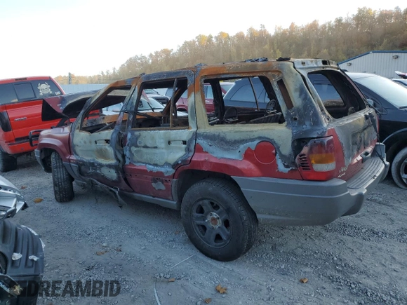 2002 Jeep Grand Cherokee z VIN 1J8GW38S72C159886, wystawiony jako Copart lot #77765704 z przebiegiem Nie podano mil oraz Szkoda całkowita • Salvage title. Historia ofert i sprzedaży dostępna na DreamBid. Obrazek 2.