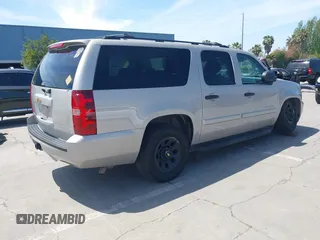 2007 Chevrolet Suburban LS with VIN 1GNFC16027J202168, listed as a IAAI auction lot 42100210 with Not Provided miles and . Bid and sale history available at DreamBid. Image 4.
