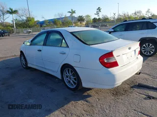 2003 Toyota Camry LE with VIN 4T1BE32KX3U196211, listed as a IAAI auction lot 41535512 with 184,473 mi miles and . Bid and sale history available at DreamBid. Image 3.
