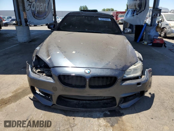 2014 BMW M6 z VIN WBSLX9C52ED160538, wystawiony jako Copart lot #64329095 z przebiegiem Nie podano mil oraz Szkoda całkowita • Salvage title. Historia ofert i sprzedaży dostępna na DreamBid. Obrazek 5.