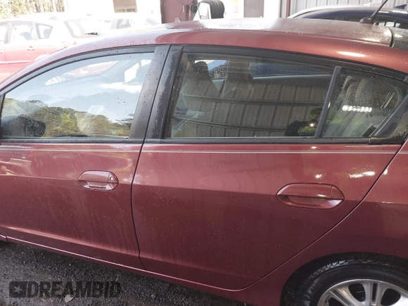 2010 Honda Insight EX z VIN JHMZE2H7XAS001280, wystawiony jako IAAI lot #41982398 z przebiegiem 142 434 mil mil oraz . Historia ofert i sprzedaży dostępna na DreamBid. Obrazek 14.