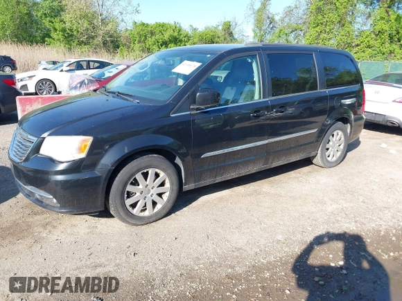 2013 Chrysler Town & Country Touring with VIN 2C4RC1BG3DR759137, listed as a IAAI auction lot 42138138 with 196,397 mi miles. Bid and sale history available at carsss.com. Image 2.