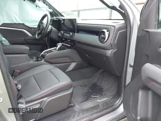 2024 Chevrolet Colorado 4WD Z71 with VIN 1GCPTDEK0R1310857, listed as a IAAI auction lot 42412552 with 11,628 mi miles and . Bid and sale history available at DreamBid. Image 5.