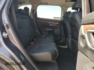 2021 Honda CR-V Touring z VIN 5J6RW2H94ML019220, wystawiony jako Copart lot #51437405 z przebiegiem 35 362 mil mil oraz Czysty tytuł • Clean title. Historia ofert i sprzedaży dostępna na DreamBid. Obrazek 11.